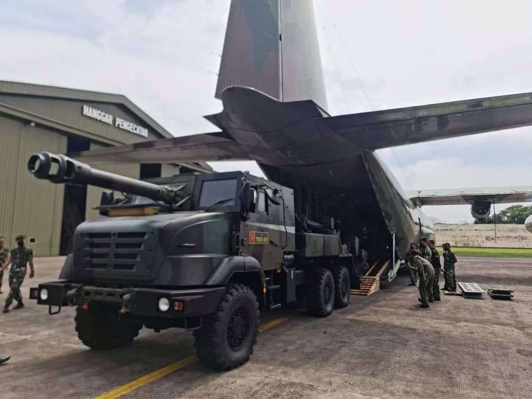 155 mm French self-propelled artillery installation CAESAR is being loaded on a military transport aircraft, S-130.