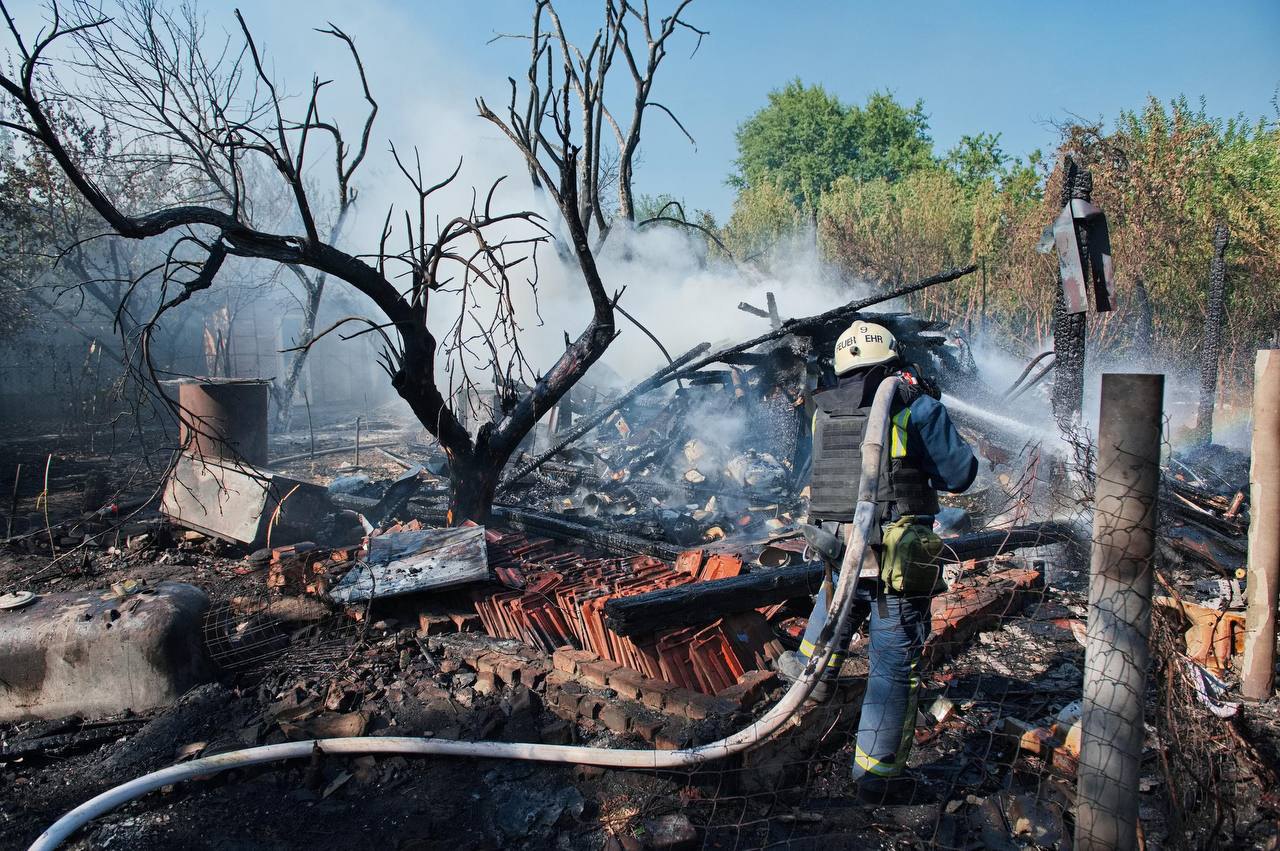 Rescuers at the site of the shelling of Kharkiv on 1 September, 2024