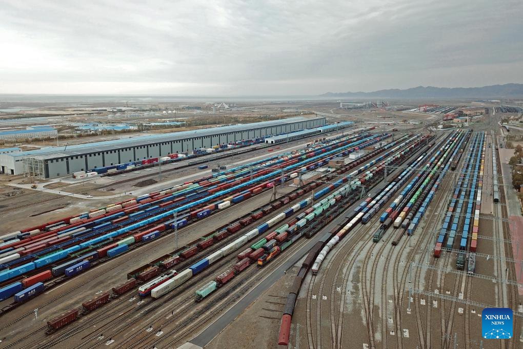 Freight trains are waiting to depart at Alatau Station in the Xinjiang Uyghur Autonomous Region in northwest China, which borders Kazakhstan.