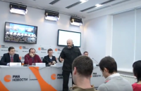 Russian news agency says "radicals" disrupt Kyiv event
