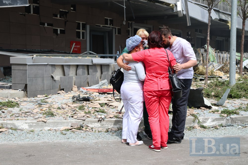 Okhmatdyt medics in the yard near the destroyed building