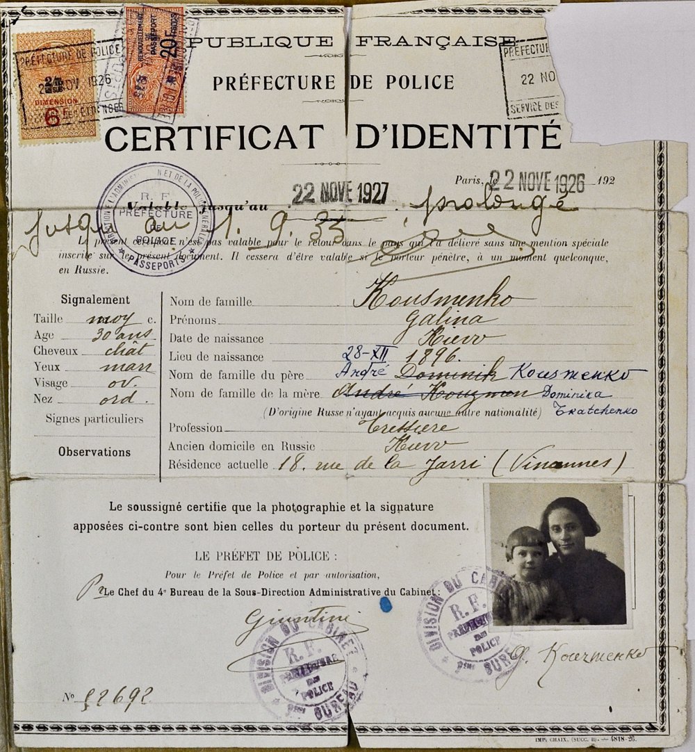  Identity document issued in 1926 to Nestor Makhno’s wife, Halyna Kuzmenko. In the photo, she is holding her 4-year-old daughter, Olena Mikhnenko