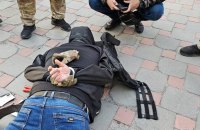 Man breaks into business center, opens fire in Kyiv