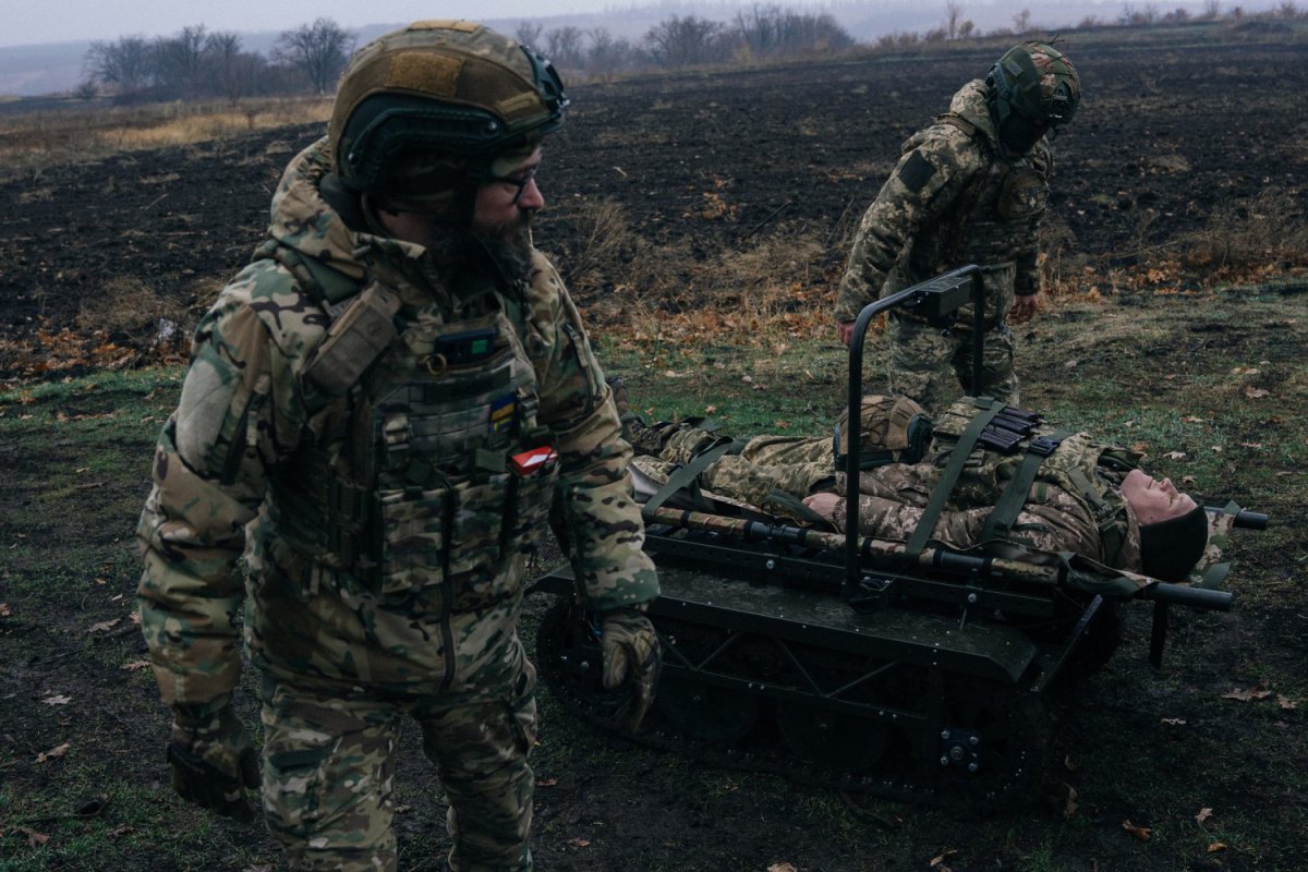  28th Separate Mechanized Brigade “Knights of the Winter Campaign” soldiers evacuate a wounded serviceman using a UGV.
