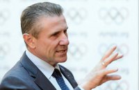 National Olympic Committee re-elects president