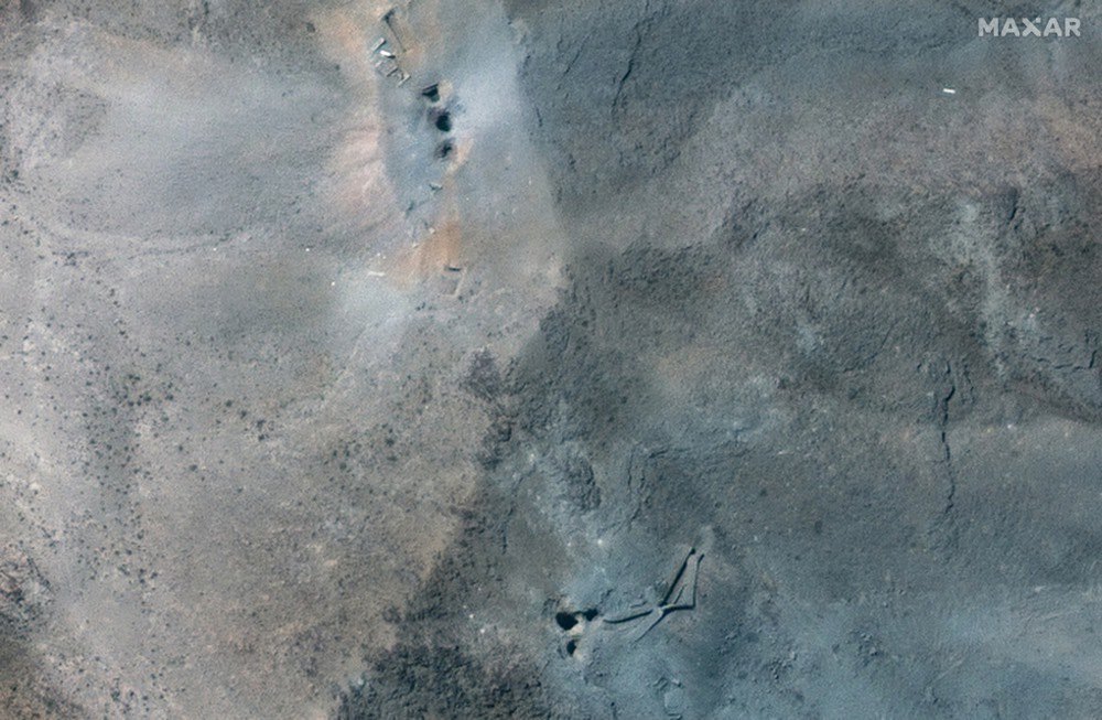 Craters after US airstrikes on the underground uranium enrichment plant at Fordow, 22 June 2025
