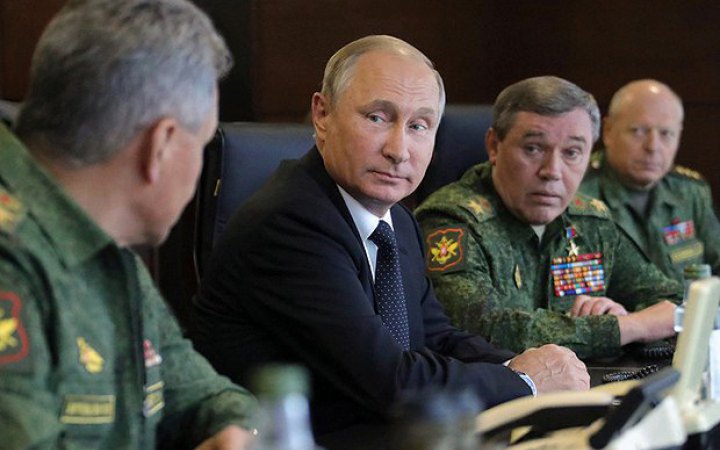 Russian Defense Minister Sergei Shoigu, President Vladimir Putin and Deputy Defense Minister Valeriy Gerasimov