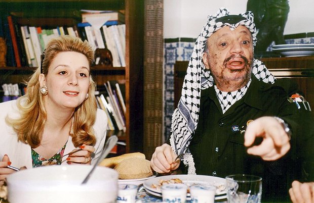 Yasser Arafat and his wife Suha during a family dinner in their Tunisian house, 1993