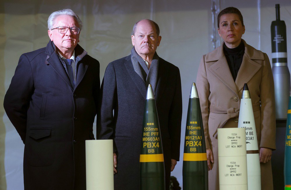 <i>Rheinmetall</i> CEO Armin Papperger, German Chancellor Olaf Scholz and Danish PM Mette Frederiksen during the groundbreaking ceremony for <i>Rheinmetall's</i> new ammunition plant in Unterluss, Germany, 12 February 2024.