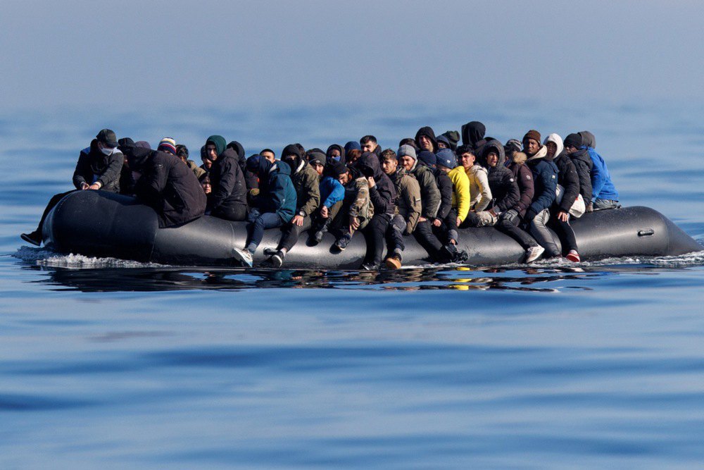 About 60 migrants cross the English Channel on an inflatable boat to seek asylum in the UK, 6 March 2024.