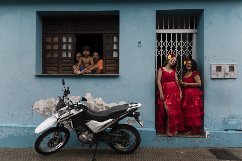 Women in flamenco costumes during the Maragojipe Carnival, Brazil, 11 February 2024.