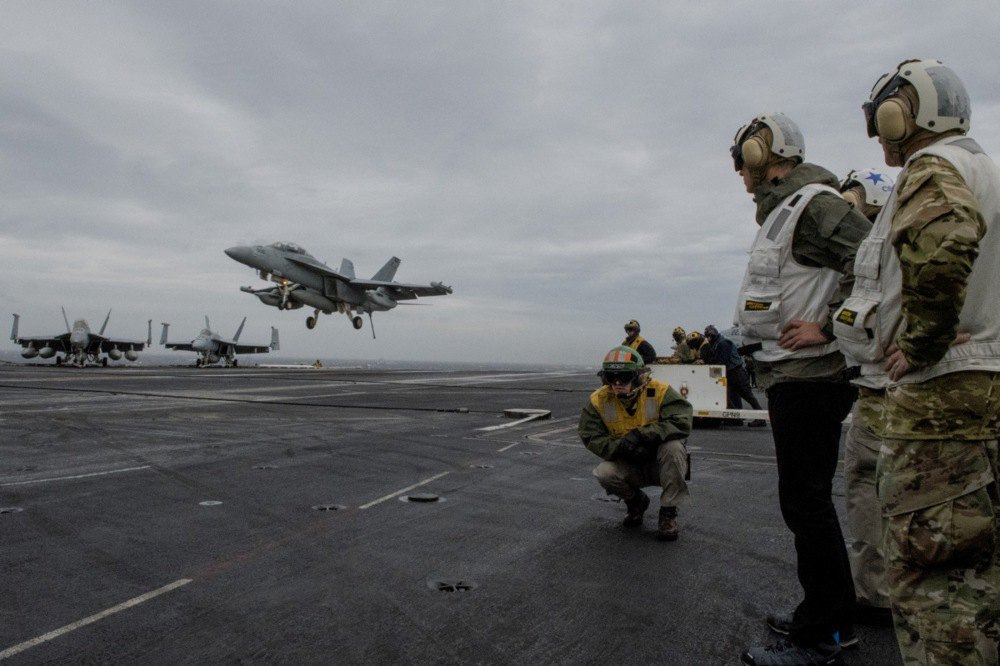 USS Harry S. Truman with fighter jets