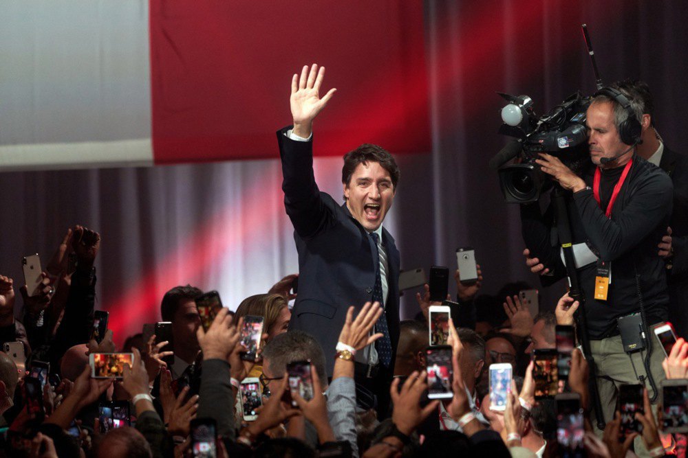 Canadian Prime Minister and leader of the Liberal Party Justin Trudeau greets supporters after winning the election in Montreal, 21 October 2019.