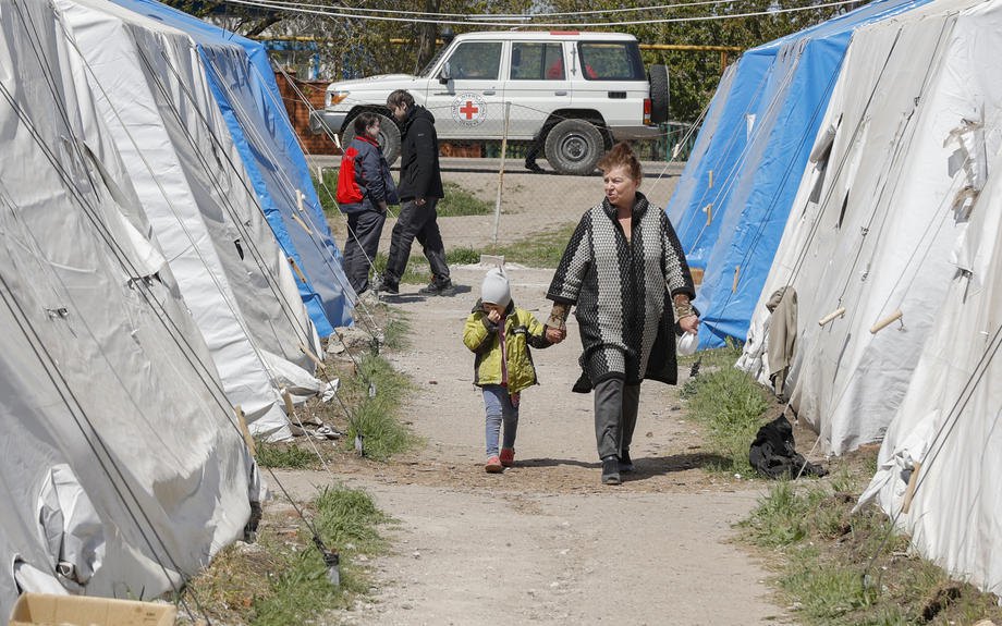 People in a filtration camp in the village of Bezimenne