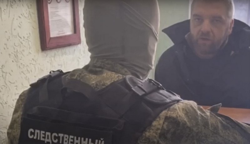 Serviceman Maksym Butkevych during interrogation in captivity.