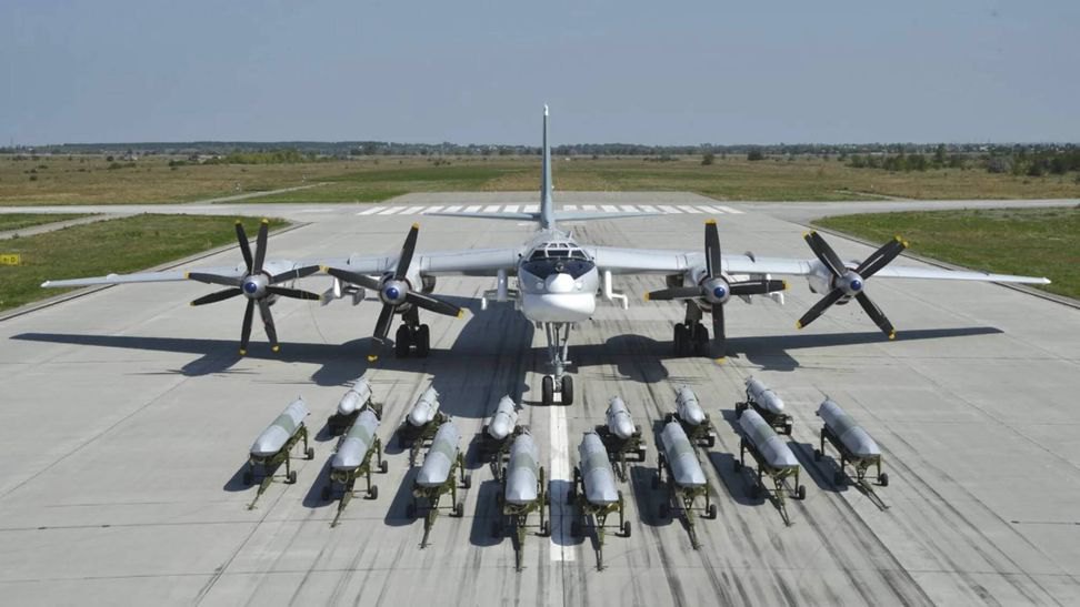 Tu-95MS with Kh-101 missiles in the foreground.