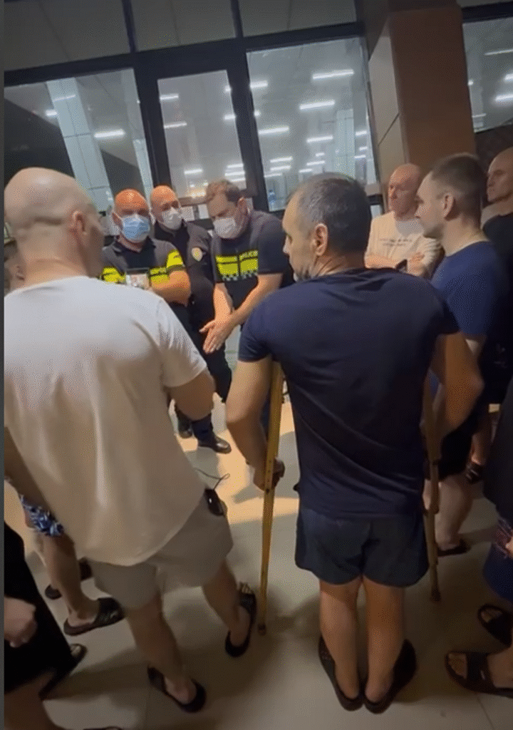 Ukrainians protesting at a detention centre on the Georgian border