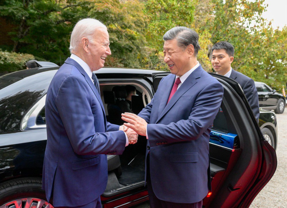 US President Joe Biden greets Chinese President Xi Jinping during a meeting in San Francisco 