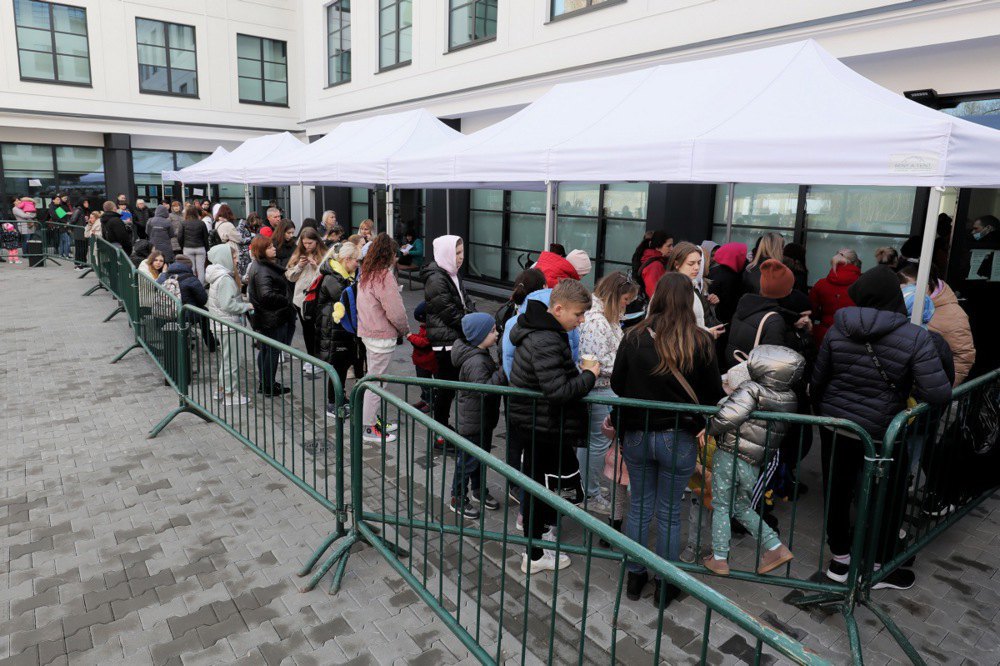 A queue of Ukrainians near the IDP Assistance Centre, Office of the UN High Commissioner for Refugees in Warsaw, 7 April, 2022
