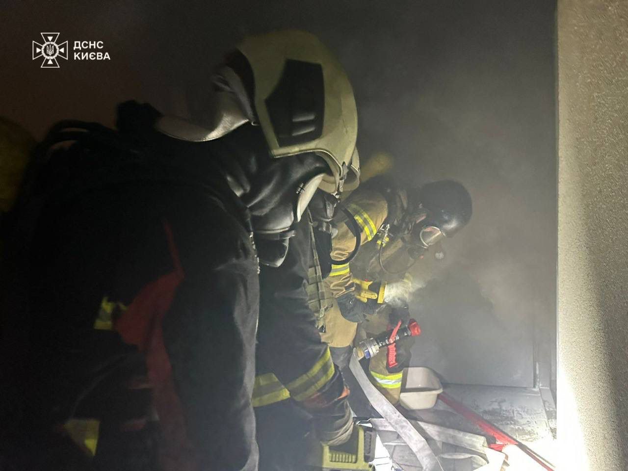 Rescuers extinguish a fire in Kyiv as a result of a Russian UAV hit on 25 October, 2024