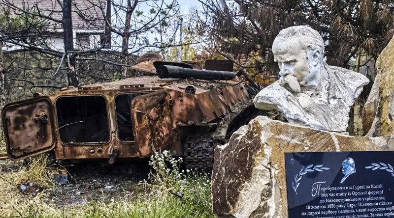 Damaged monument to Taras Shevchenko near the destroyed APC in the village of Cherkaski Tyshki in the Kharkiv Region, October 2022.