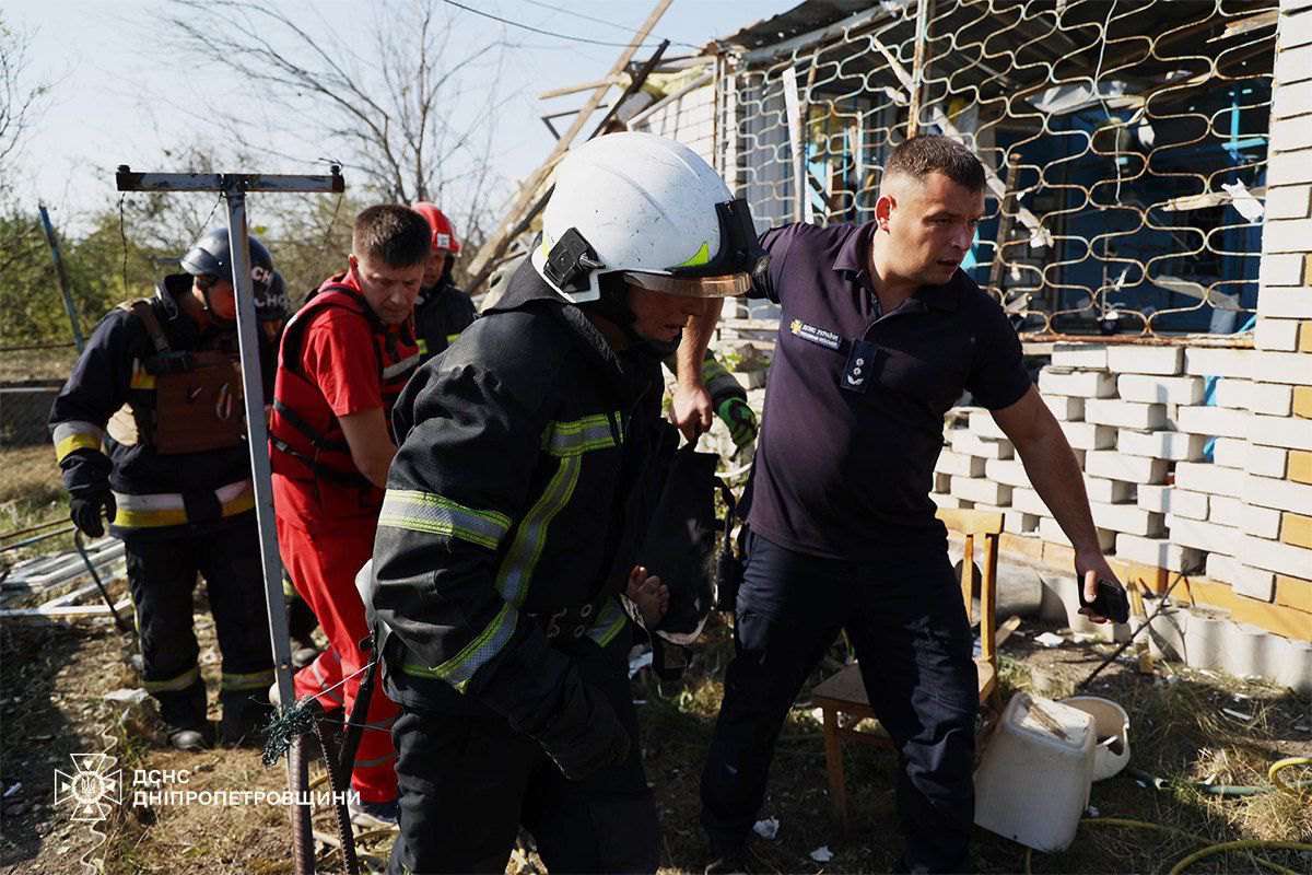 Rescuers work at the shelling site in Dnipropetrovsk Region