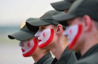 Ukrainian border guards paint faces in Liverpool, Real Madrid colours