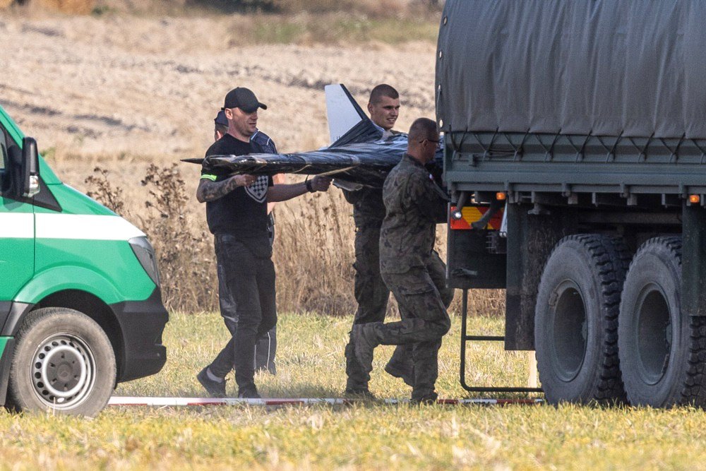 Polish soldiers load a drone from the crash site in the village of Wohyn, eastern Poland, on 10 September 2025.