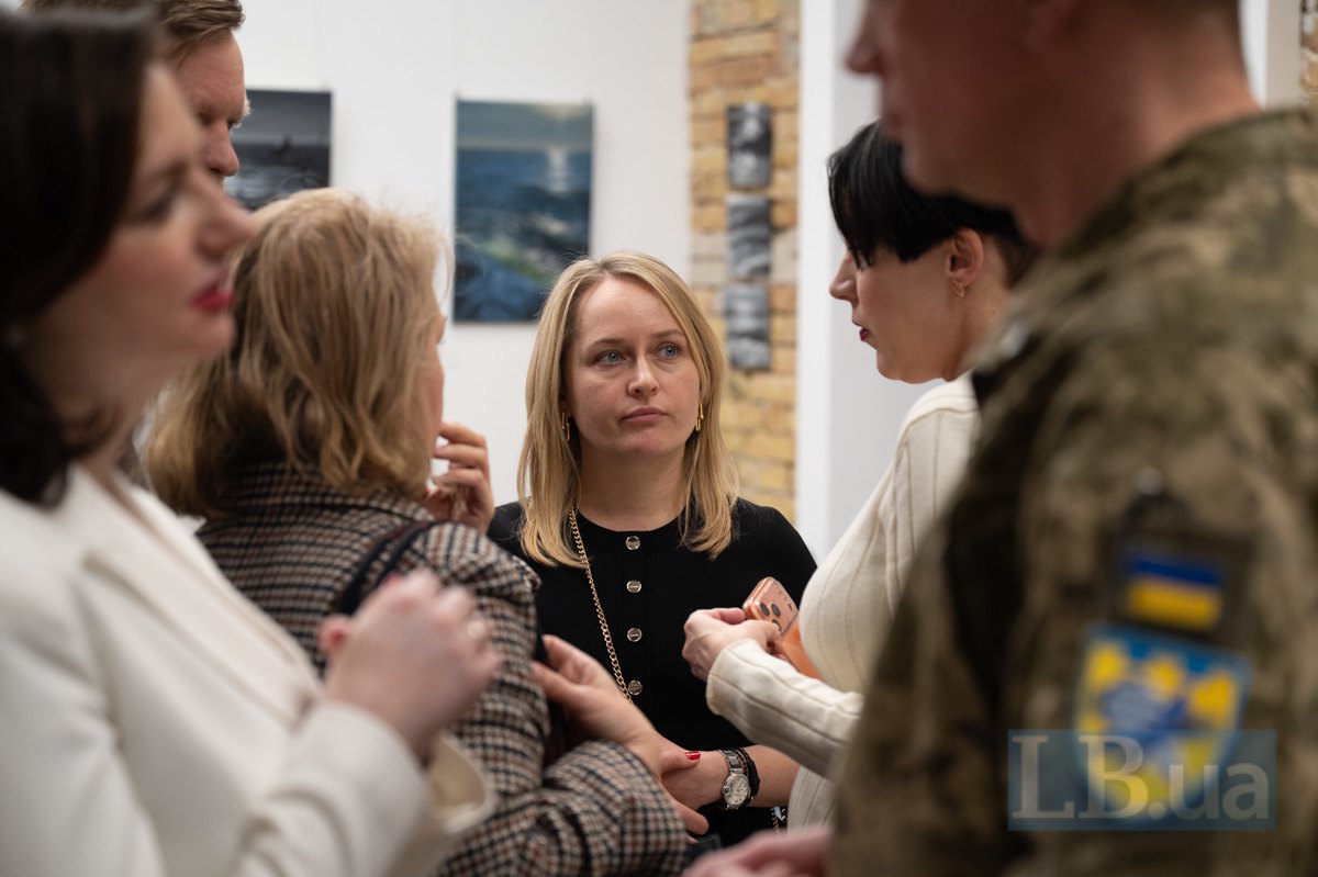Yana Matviychuk, the owner of the craft cider production plant in Transcarpathia (centre)