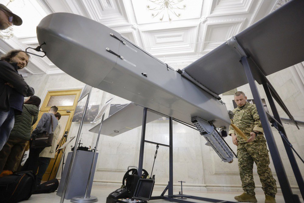 People look at the FP-1 unmanned aerial vehicle in Kyiv, 6 May 2025