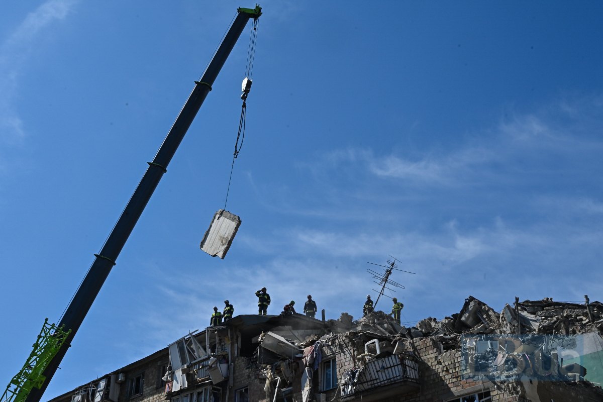 At the site of the strike on a five-story building in the Darnytskyy district of Kyiv.