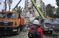 ‘Saw with my own eyes a girl jump out of a ninth-floor window’: Kyiv reels after massive Russian missile strike
