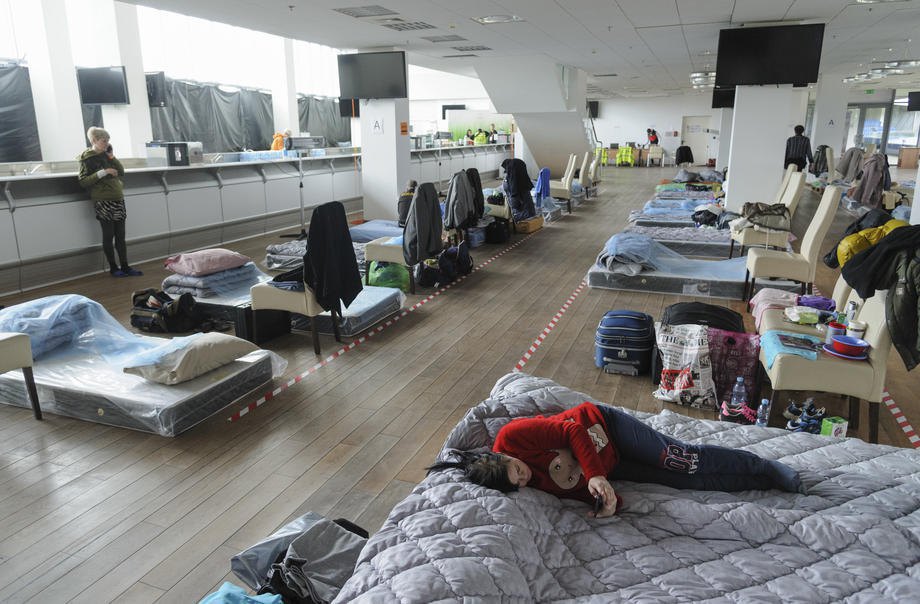 Refugees from different parts of Ukraine live in a resettlement center set up at the stadium in the city of Lviv. April 21, 2022
