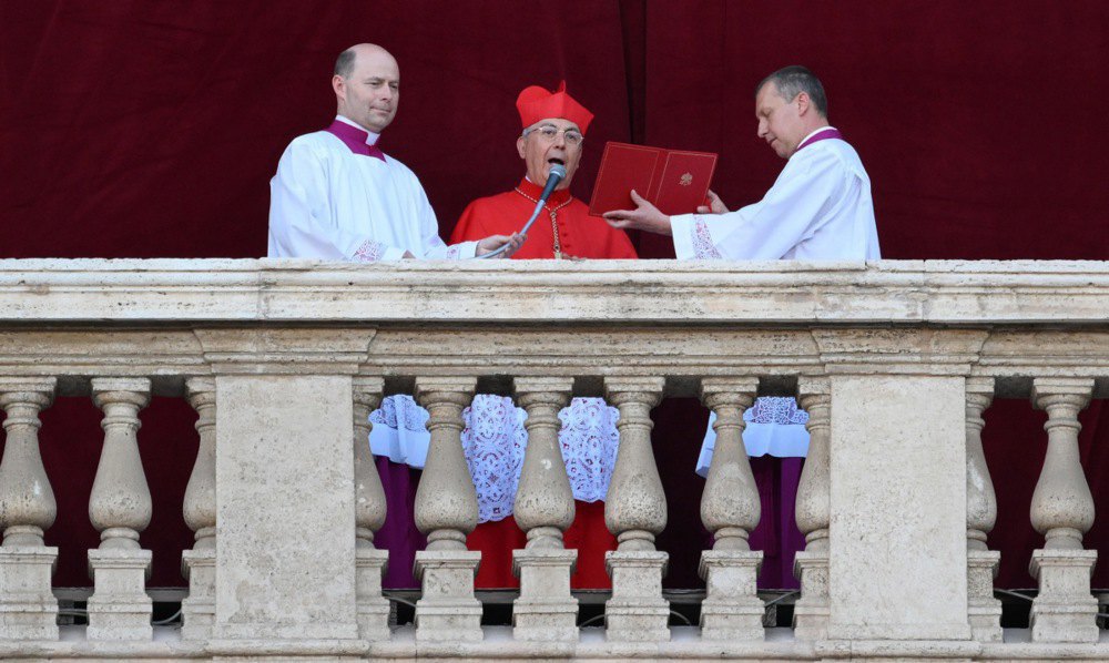 Cardinal Protodeacon Dominique Mamberti proclaims "Habemus Papam" and the name of the newly elected Pope Leo XIV from the central loggia of St Peter's Basilica, Vatican City, 8 May 2025.