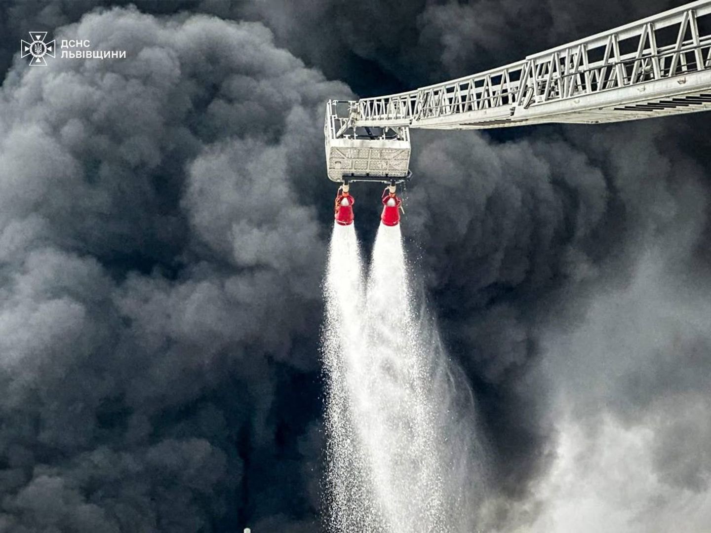 Rescuers are extinguishing the fire that arose as a result of the Russian Federation's attack on the Lviv Region on 27 January, 2026.