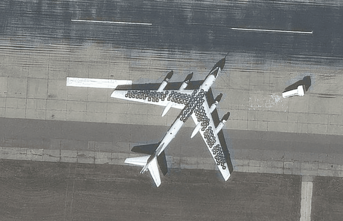 Car tires on the wings and body of the Tu-95