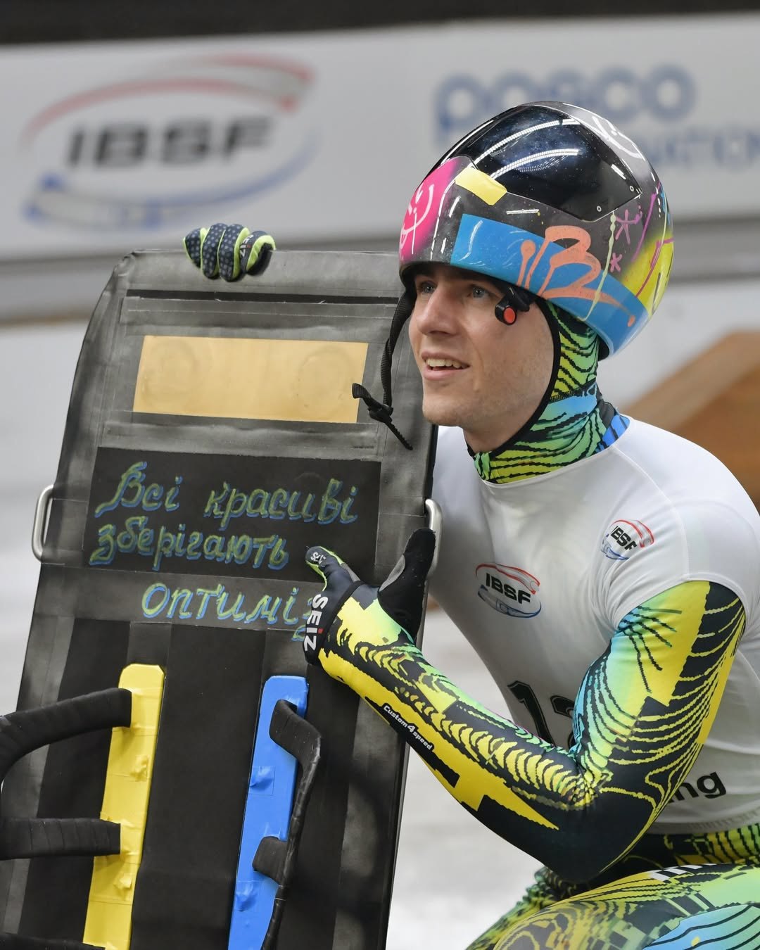  Vladyslav Heraskevych shows his skeleton, which features a quote from soldier Pavlo Petrychenko: "All the beautiful keep their optimism"