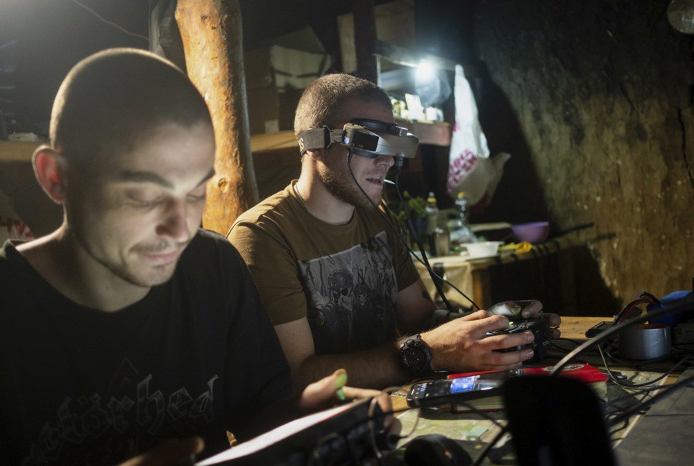 Pilots pilot FPV drones while working on the front line near the town of Chasiv Yar, Donetsk region, on July 29, 2025.