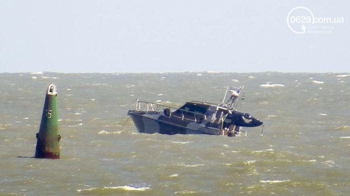 A coast guard patrol boat of the State Border Service of Ukraine, which patrolled the sea in
Mariupol's Prymorskyy district, hit an unidentified explosive device on 7 June 2015.