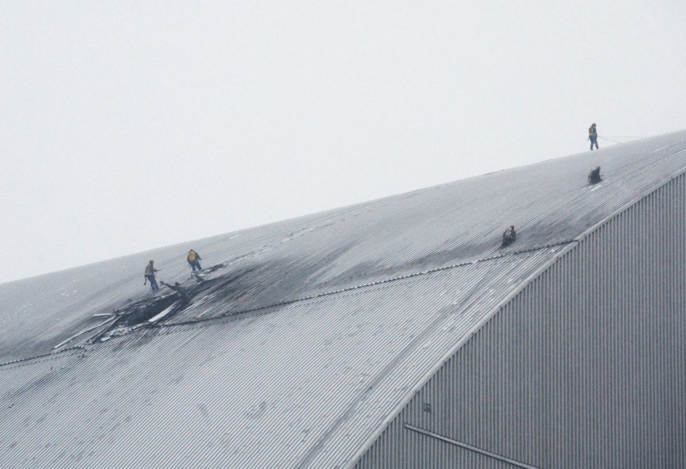 Rescuers are working on a damaged protective shelter over the remains of block № 4 at the Chernobyl nuclear power plant, 14 February, 2025