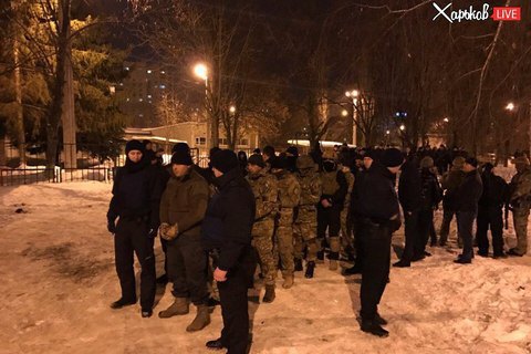 Police detain camouflaged men over Kharkiv shootout