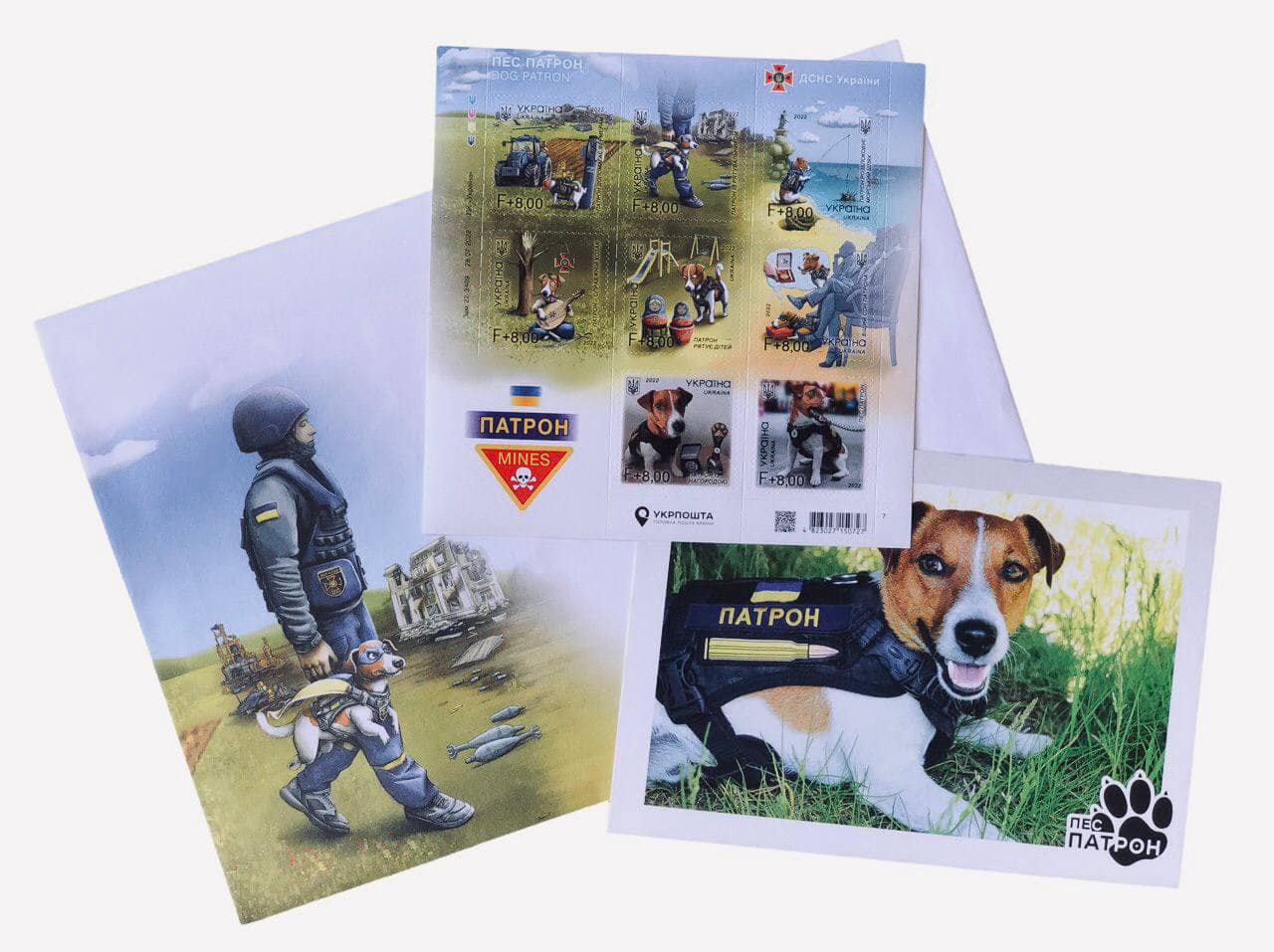 Stamps, envelope and postcard Dog Patron