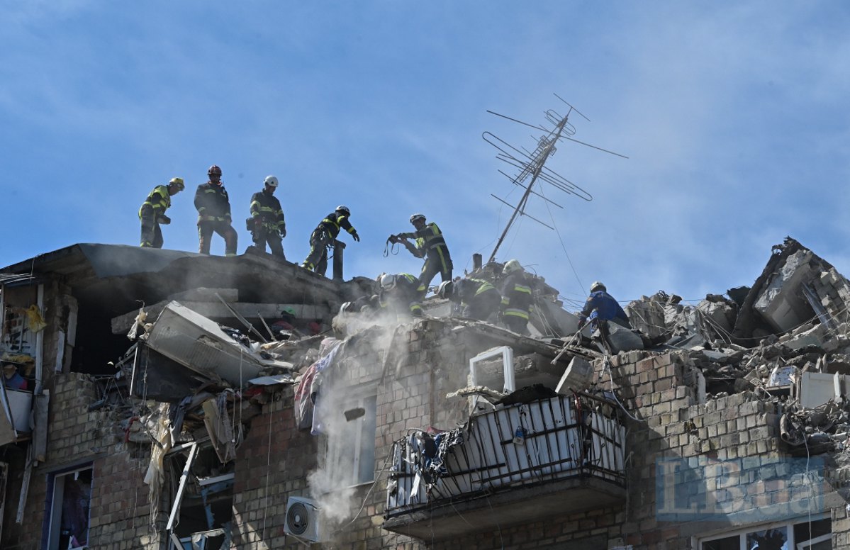At the site of the strike on a five-story building in the Darnytskyy district of Kyiv.