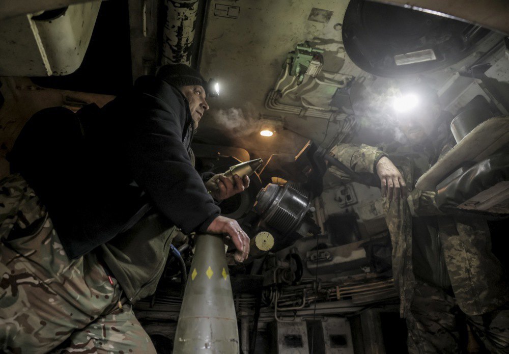 Soldiers of the 24th Separate Mechanised Brigade of the Armed Forces of Ukraine are preparing for battle the 155 mm M109 Paladin howitzer near Chasiv Yar in the Donetsk Region, 16 January, 2025,