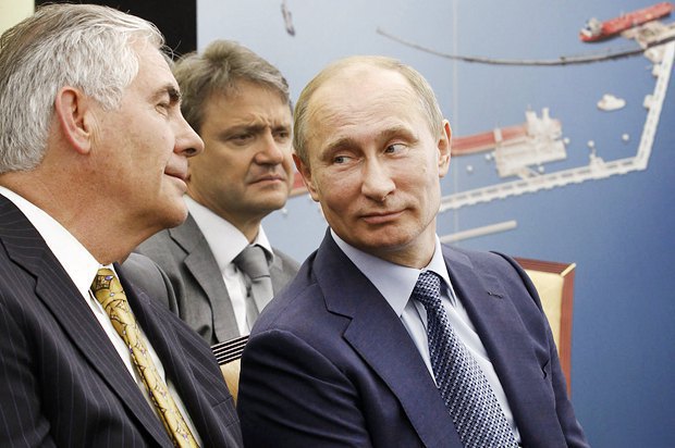 Rex Tillerson (left) meeting Vladimir Putin (right) in Russia in 2012