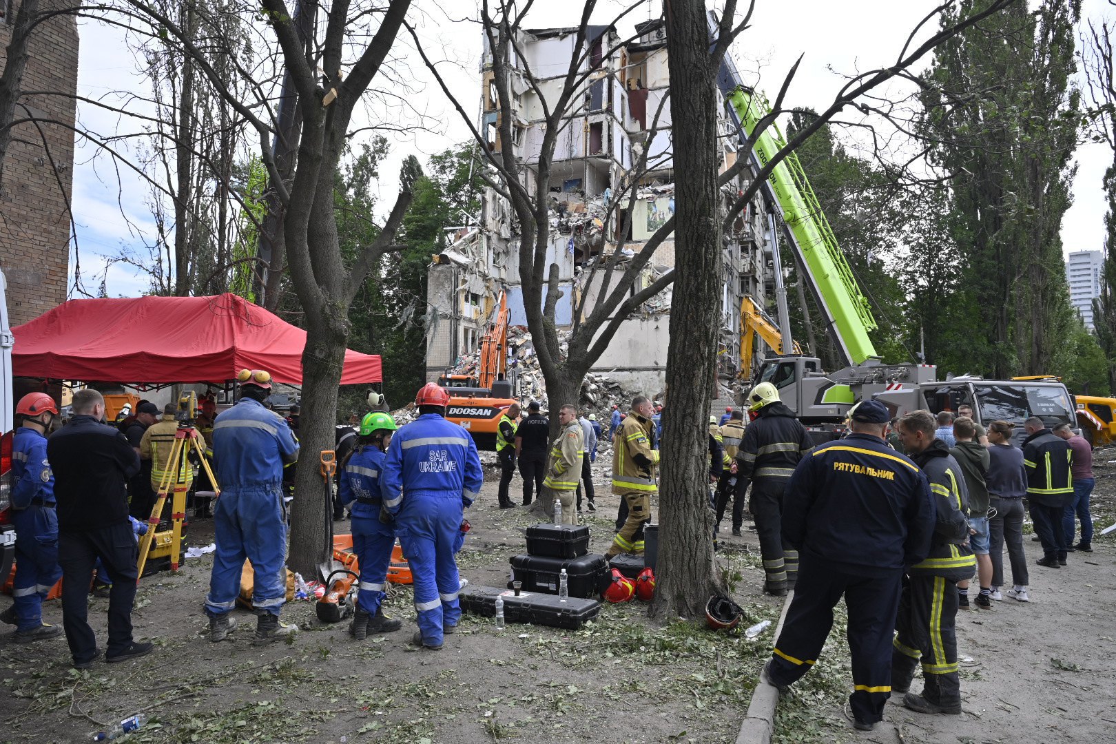 Rescuers at the missile strike site