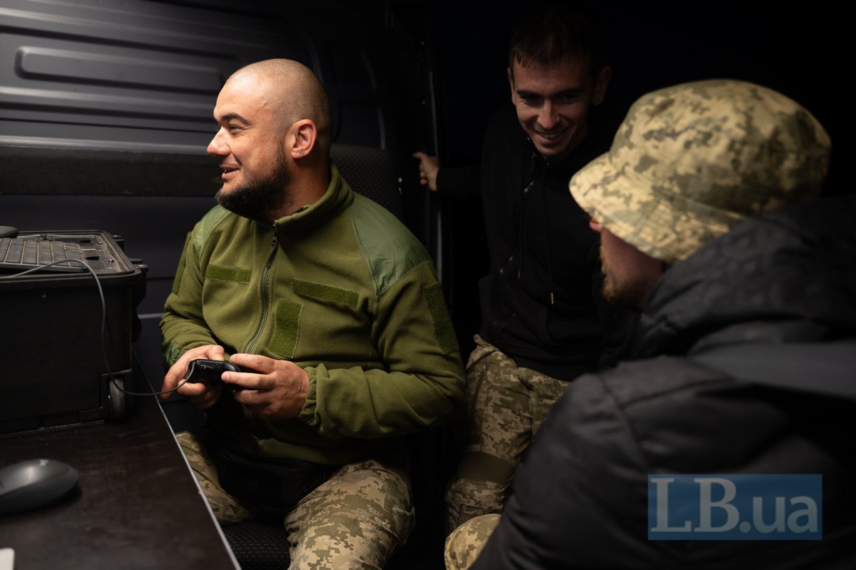 Dmytro, Denys and Luka (with his back to the camera)