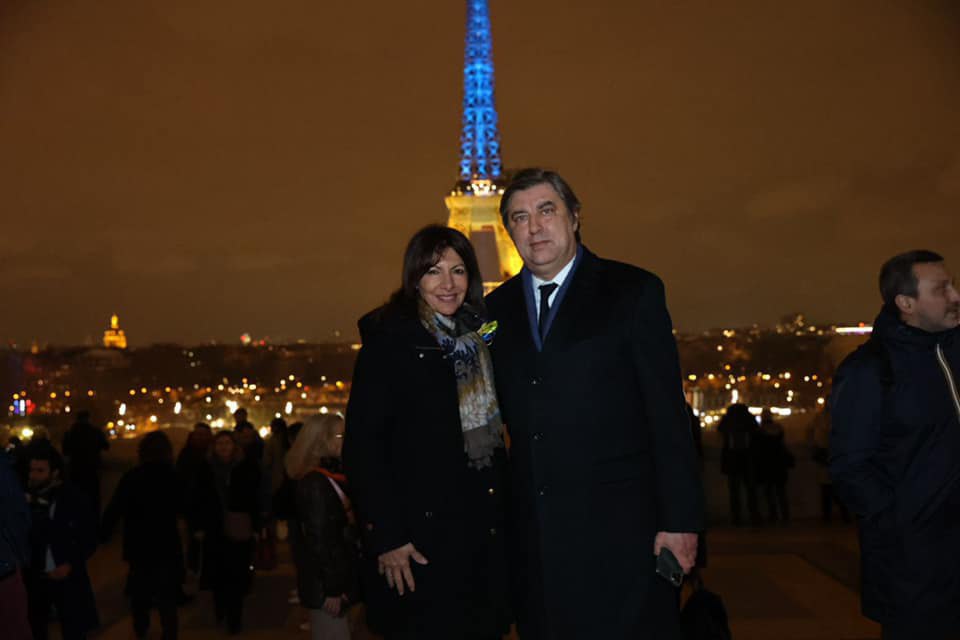 Paris Mayor Anne Hidalgo and Ukraine's Ambassador to France Vadym Omelchenko in Paris on 23 February, when the Eiffel Tower was illuminated in yellow and blue on the anniversary of Russia's invasion of Ukraine