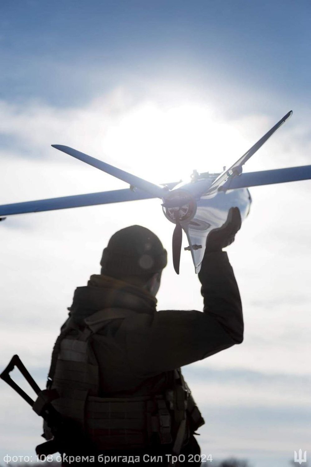 A soldier of the 108th Separate Brigade of the Ukrainian Territorial Defence Forces launches a Ukrainian reconnaissance drone Leleka 