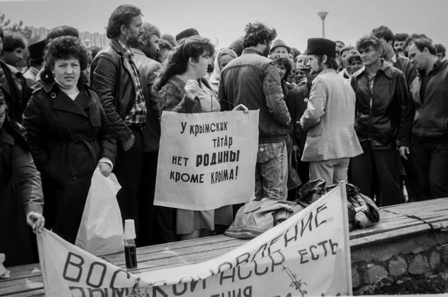 People in protests holding poster ‘Crimean Tatars have no other Motherland except Crimea’